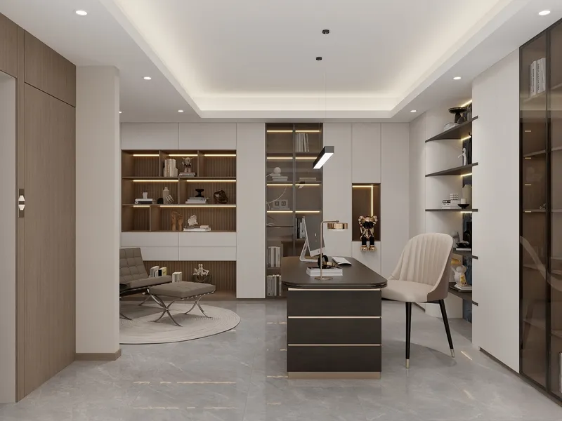 Modern home office with dark desk beige chair glass cabinet white shelves and grey footrest