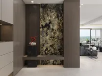 Modern entryway with red art sculpture on black block wood wall panels and marble decor