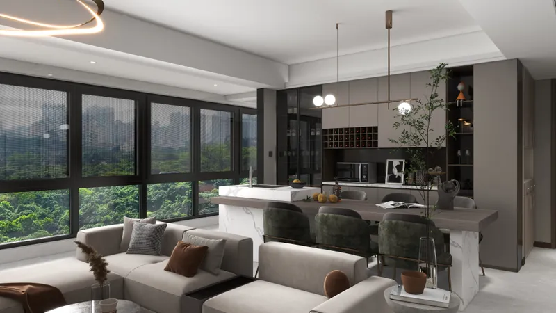 Modern open plan living room featuring grey sofa green chairs marble island and large windows