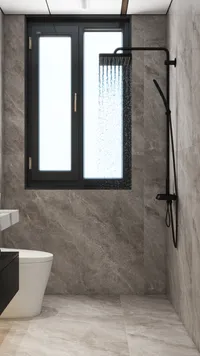 Modern bathroom shower area with black shower head running water marble walls and a window