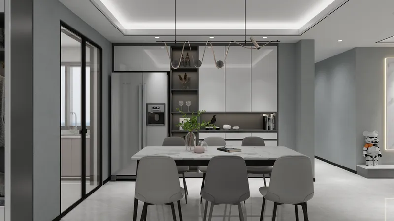 Modern dining room with marble table, grey chairs, white cabinets, large refrigerator, and ceiling light