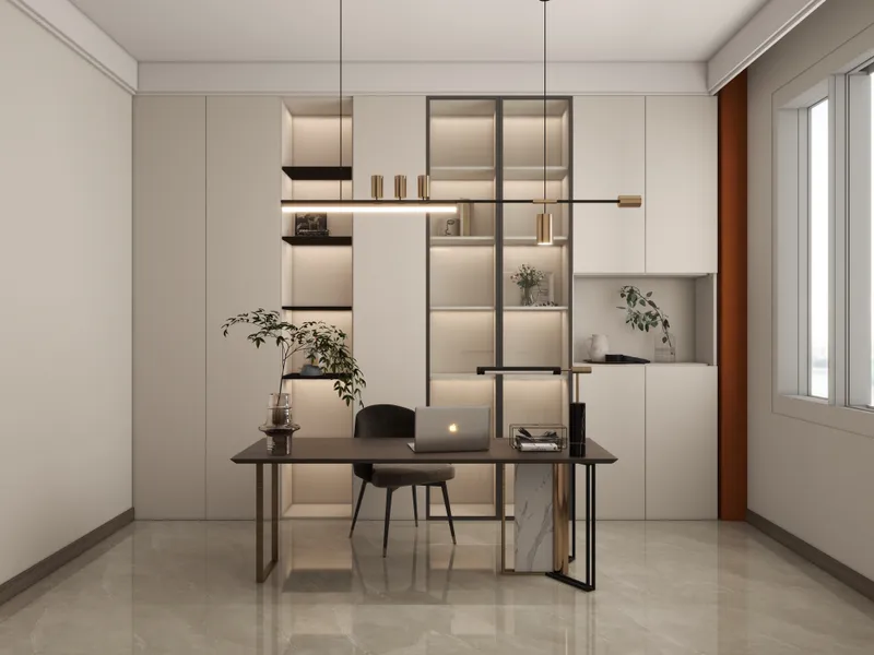 Modern home office with dark desk, grey chair, laptop, large wall cabinet and ceiling light