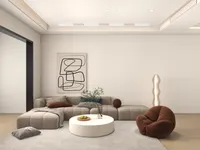 Modern living room with grey sofa brown bean bag chair white coffee table and art