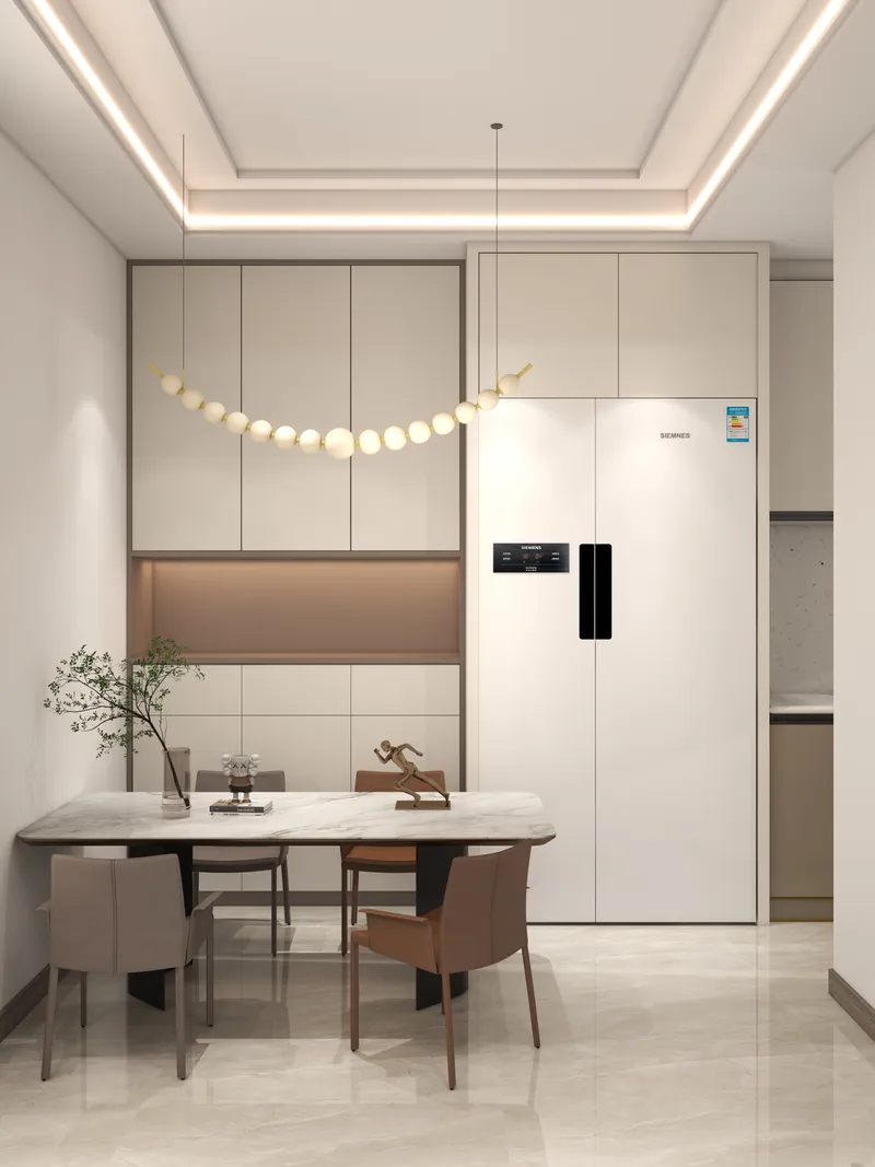 Modern dining area with marble table four chairs white cabinets white refrigerator and ceiling light
