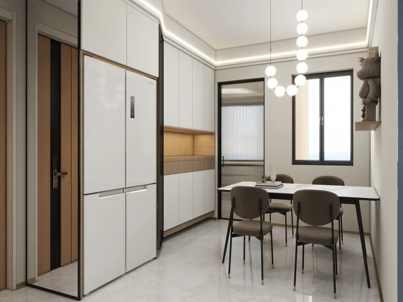 Modern kitchen and dining room with white cabinets, refrigerator, marble table, chairs, and ceiling light.