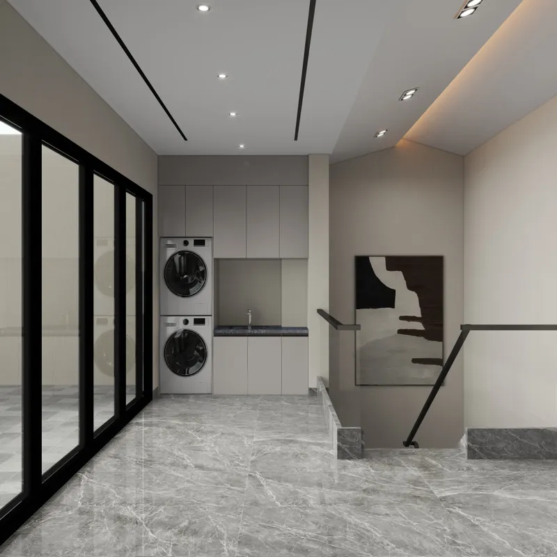 Modern laundry room with stacked washer dryer grey cabinets marble floor glass door and stairs