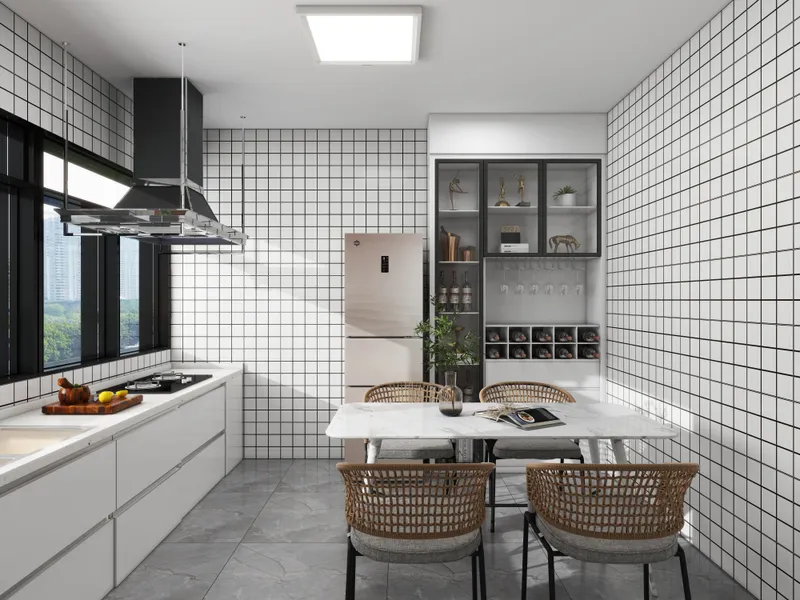 Modern kitchen dining area with white tile walls marble table woven chairs and a cabinet