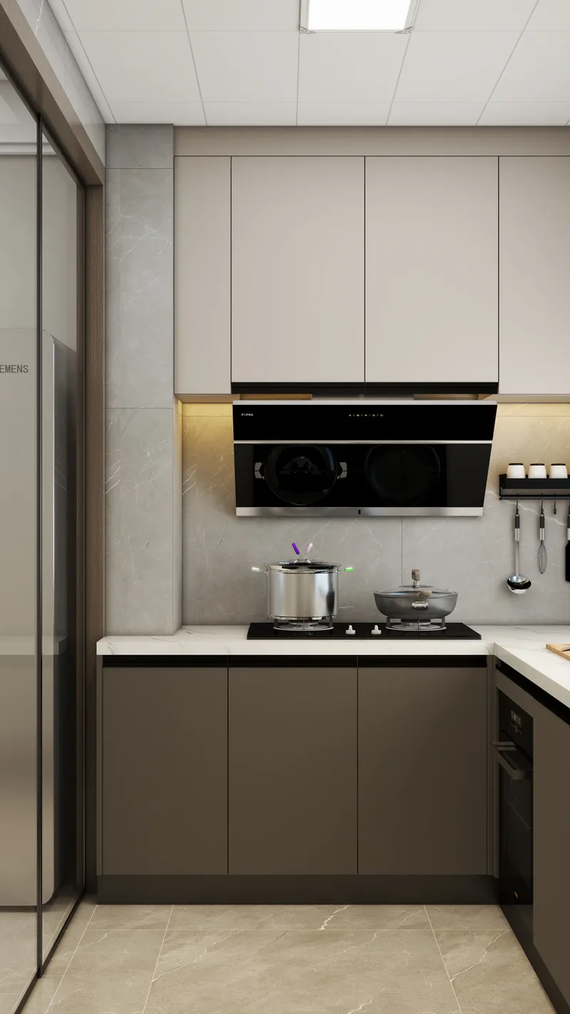 Modern kitchen with beige upper cabinets brown lower cabinets marble walls stove and vent hood