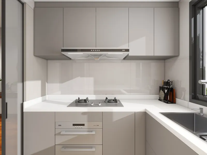 Modern grey kitchen design with white countertop gas stove oven sink and window with light