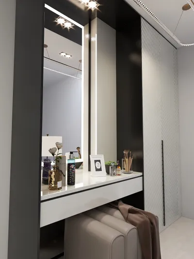 Modern white dressing table with backlit mirror, gray footrest, black wall panels, and patterned cabinet