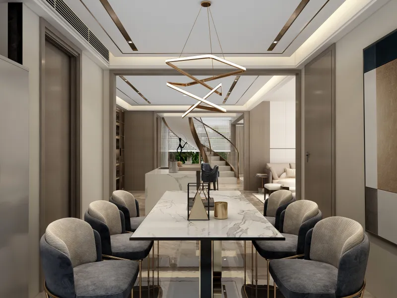 Modern dining room with marble table grey chairs gold ceiling light and a staircase background