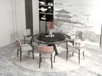 Modern dining room with round table pink chairs grey chairs ceiling light and wall art