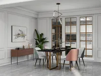 Modern dining room with black marble table pink chairs brown cabinet large plant gold light