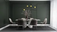 Modern dining room with dark green walls marble table grey chairs and gold ceiling light