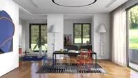 Modern dining room with colorful chairs, black table, tall white lamps, rug, and wood flooring