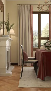 Dining room with white marble fireplace red tablecloth wooden chairs beige curtains and a window