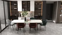 Luxury dining area with marble table, stylish colorful chairs, lighted glass cabinet, and grey floors