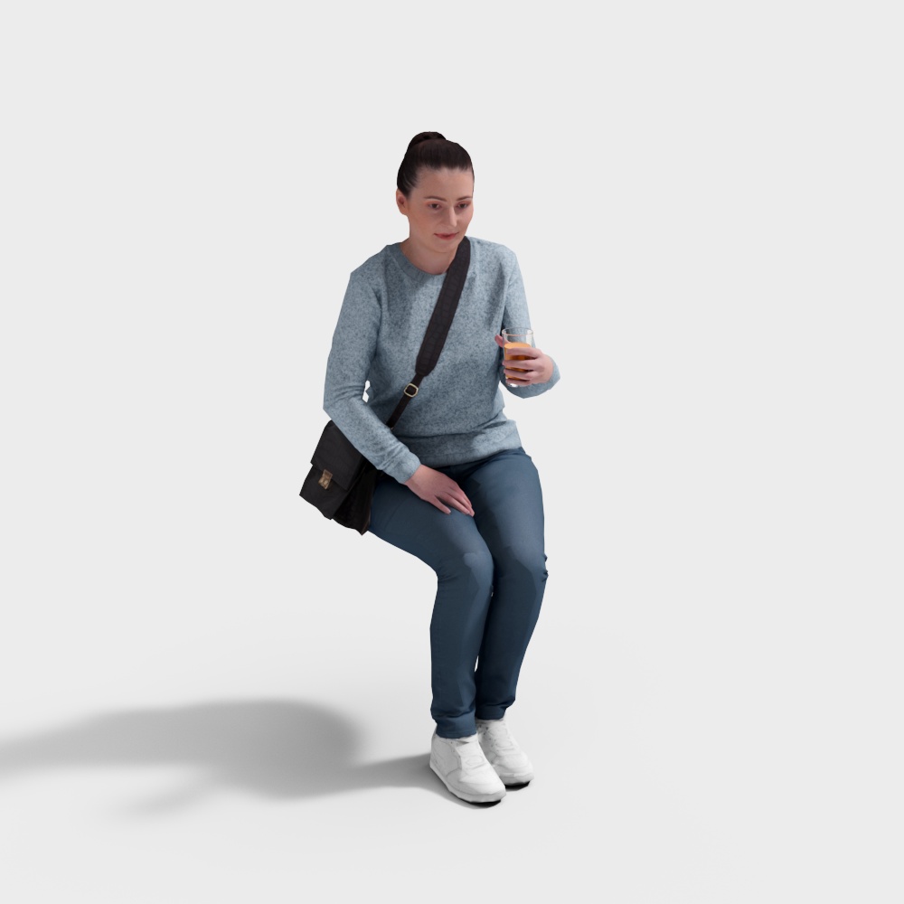 ผู้หญิงนั่งถือกาแฟ