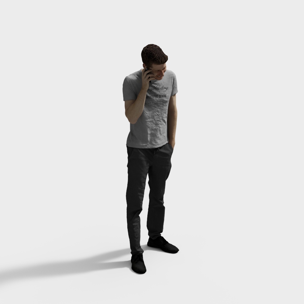 Man Standing While Taking a Phone Call