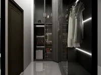 Dark wood walk in closet with glass doors lighting white marble floor and hanging clothes