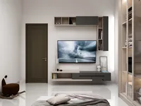 Modern bedroom wall with television grey storage cabinets brown door and small rocking horse chair