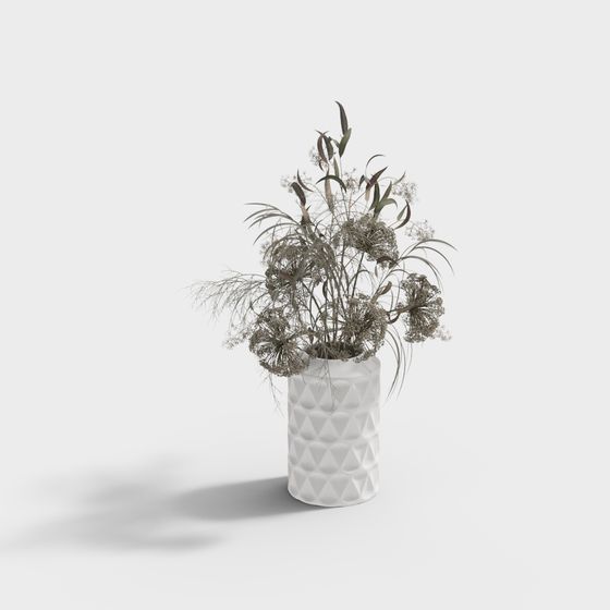 Vase avec décoration de branches sèches