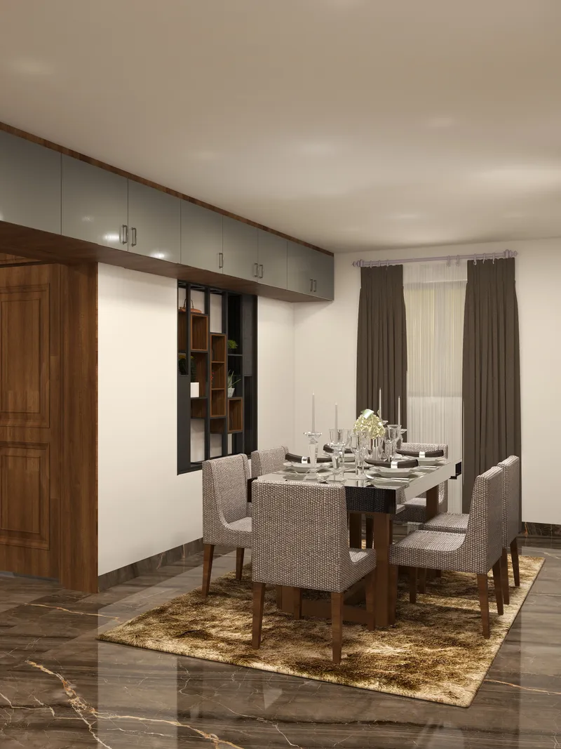 Modern dining room interior showing glass table, patterned chairs, brown curtains, and grey storage cabinets