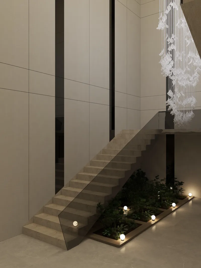 Modern stone staircase with glass railing beside indoor plants small floor lights and ceiling light