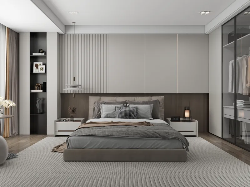 Modern bedroom with grey bed wall panels glass wardrobe ceiling light and a textured rug