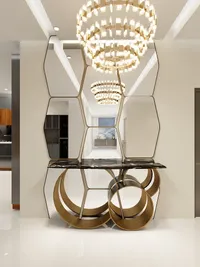 Luxury entryway featuring hexagonal wall mirror gold console table with marble top and ceiling light