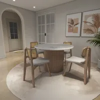 Round marble dining table with four chairs on white rug and leaf art on wall
