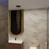 Modern bathroom with marble tiles, gold ceiling light, white sink, wooden cabinet, and black wall faucet
