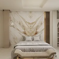 Elegant bedroom with marble wall panel, grey bed, white pillows, and tan footrest at end