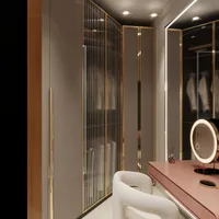 Luxury dressing room with pink vanity table lighted mirror white chair and glass door cabinet
