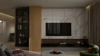 Modern living room featuring a marble wall with television, wooden wall panel and green chair