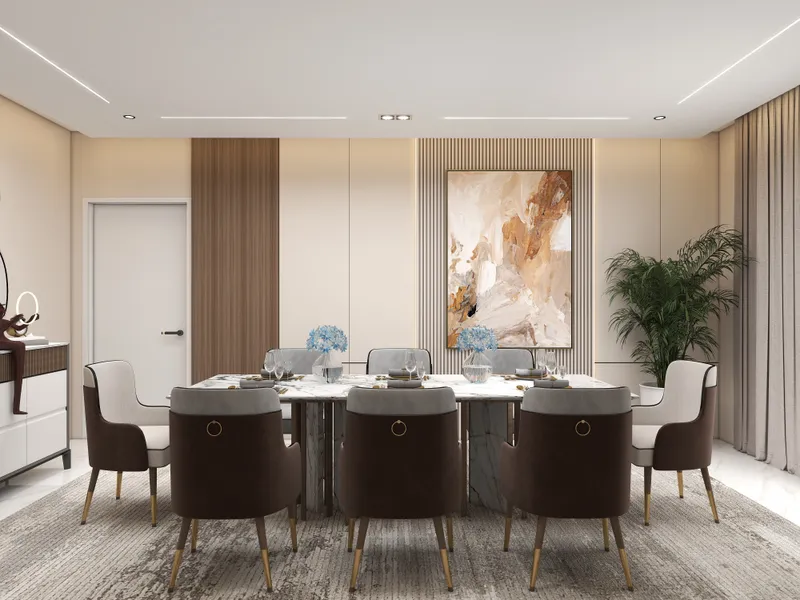 Modern dining room with marble table, six brown chairs, abstract wall art, and green plant