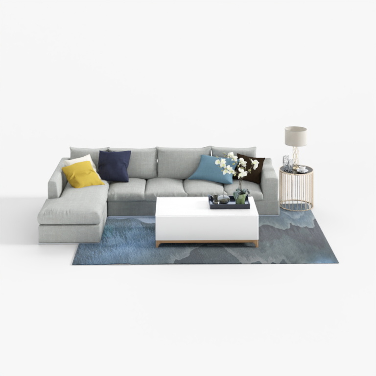 Light grey sectional sofa with colorful pillows and white coffee table on blue rug on white background