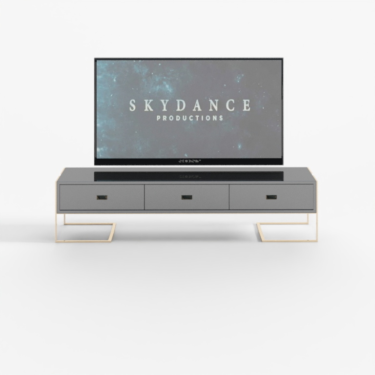 Modern grey media cabinet with gold legs and three drawers on white background