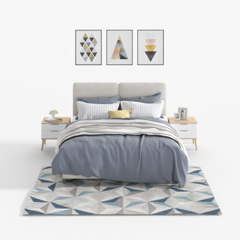 Modern grey upholstered bed with striped pillows and geometric rug on white background