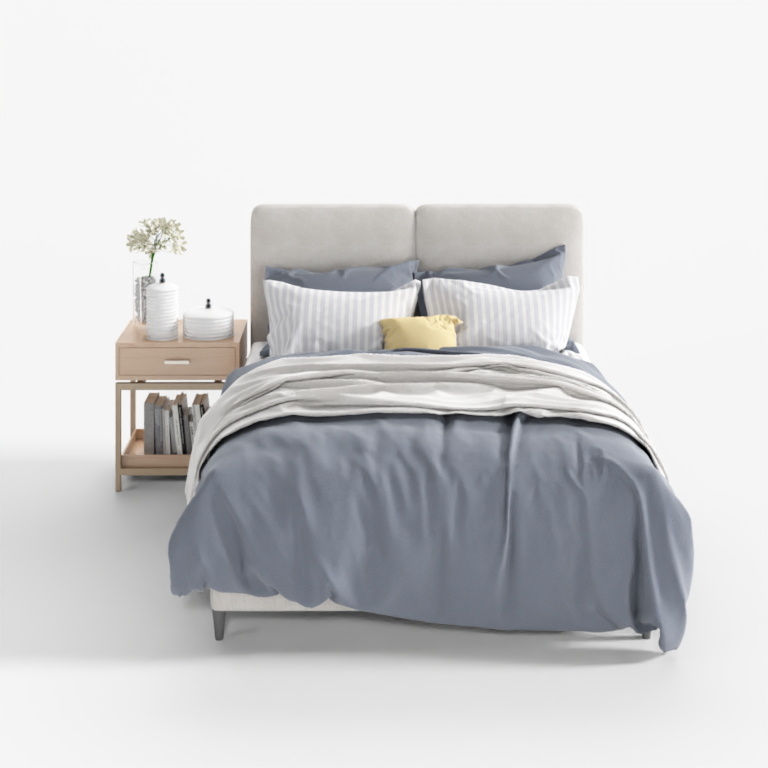Contemporary king size bed with light grey headboard and blue bedding on white background