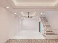 Empty room with white marble floor light walls ceiling fan white staircase and ceiling lights