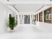 Spacious white hallway with green plant colorful wall art in wooden frames and glass doors