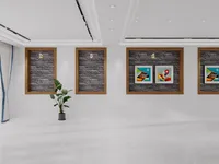 White wall with wooden frames, grey brick texture, wall light, green plant and colorful art