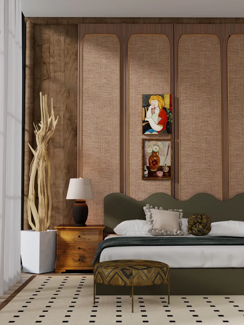 Bedroom with green headboard wooden nightstand black lamp wall panels two paintings and patterned rug