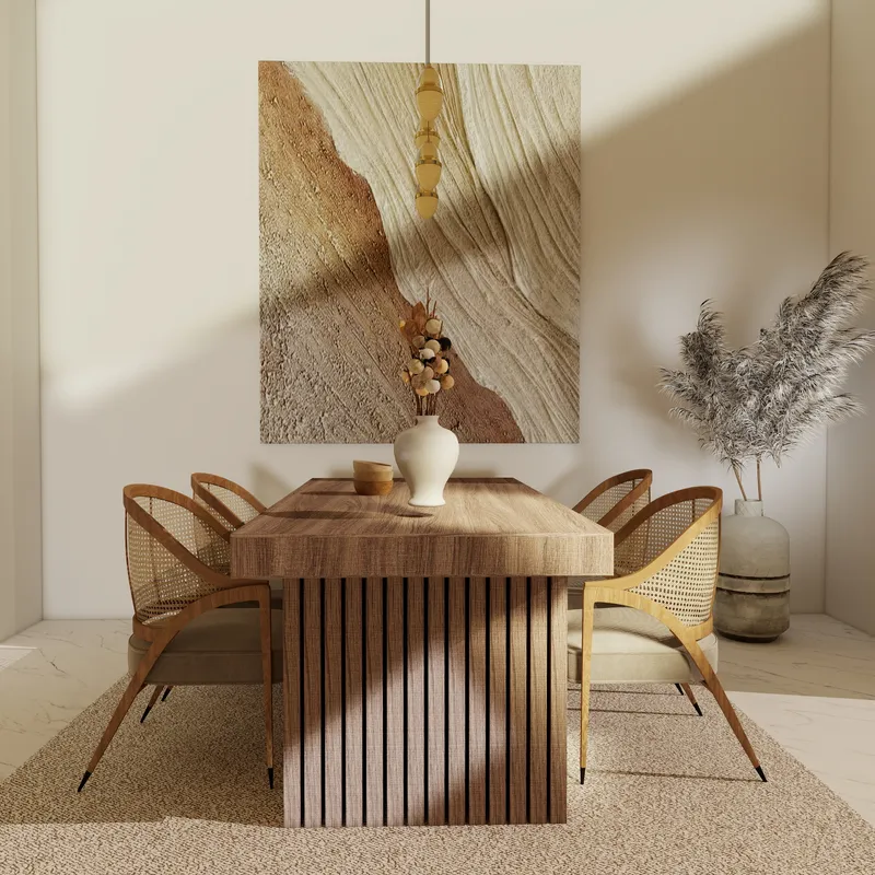 Wooden dining table with woven chairs under a ceiling light with large abstract wall painting
