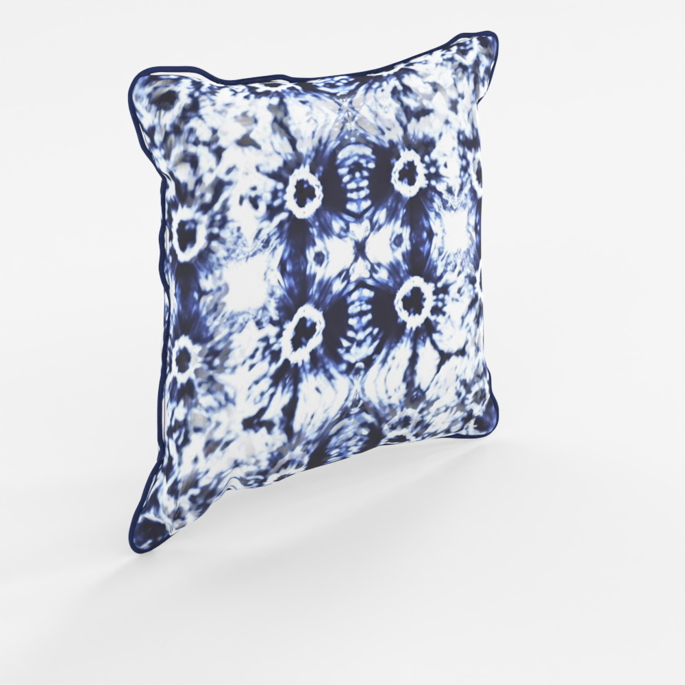 Cojín Ikat índigo de Tatie Lou & Pad