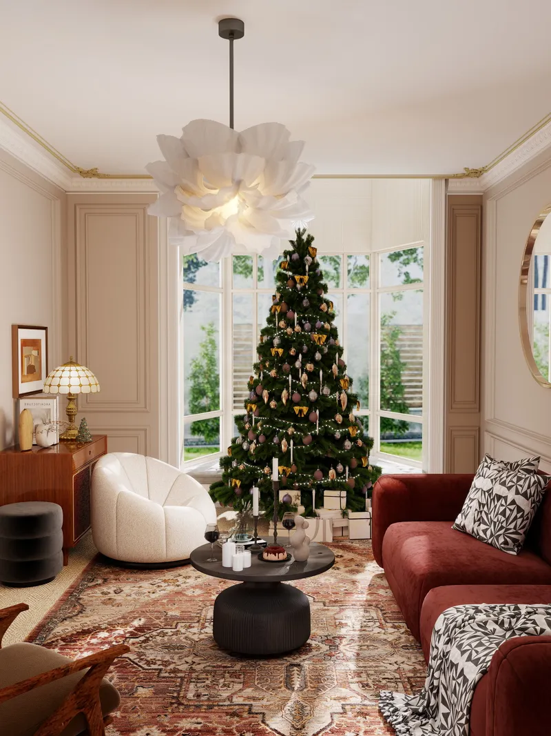 Elegant living room featuring Christmas tree, red sofa, white chair, patterned rug, and ceiling light
