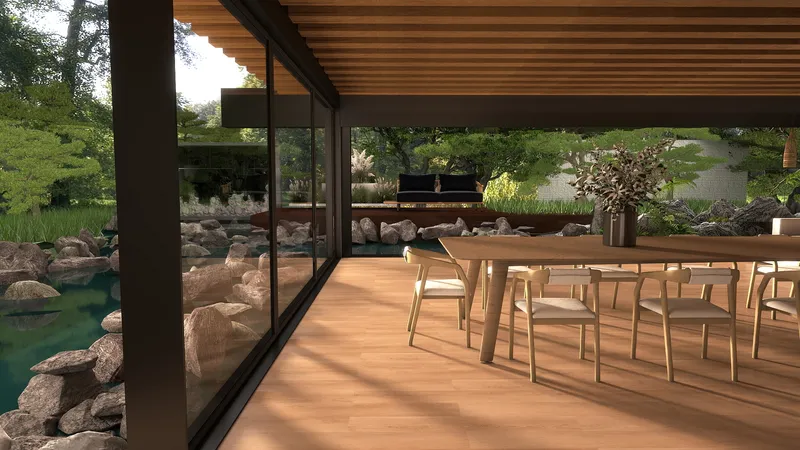 Modern dining area with wooden table and chairs looking out at a garden and pond