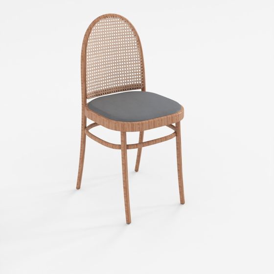 Modern wooden dining chair with grey cushion and cane back on grey background