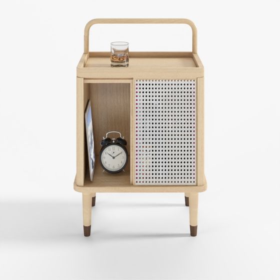 Modern light wood nightstand with rattan door and alarm clock on grey background